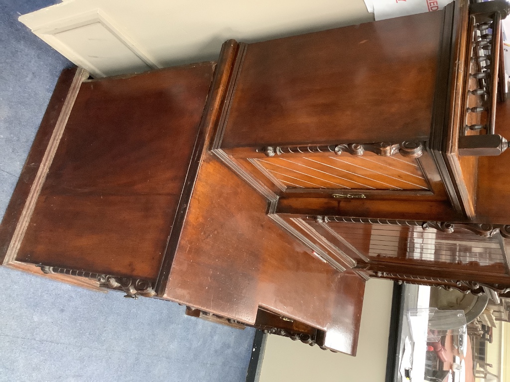 A late Victorian mahogany kneehole desk with fall front, width 151cm, depth 74cm, height 174cm
